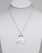 Sterling silver sycamore seed pendant on a chain