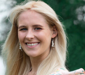 Model wearing Hydrangea dangle earrings