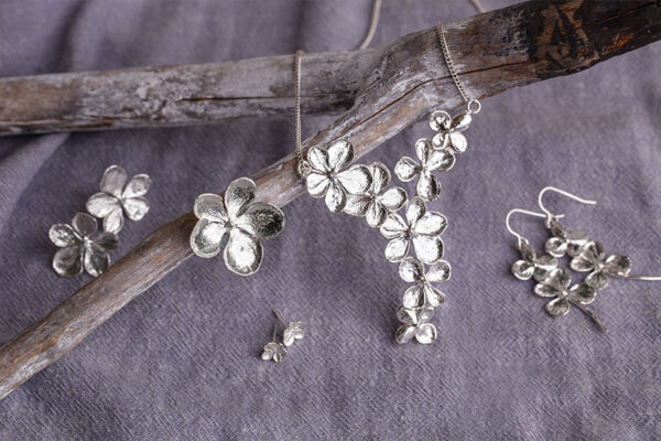 Jane Orton hydrangea jewellery on a cloth
