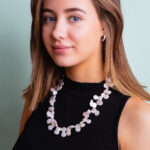 Girl wearing coin freshwater pearls necklace for sale